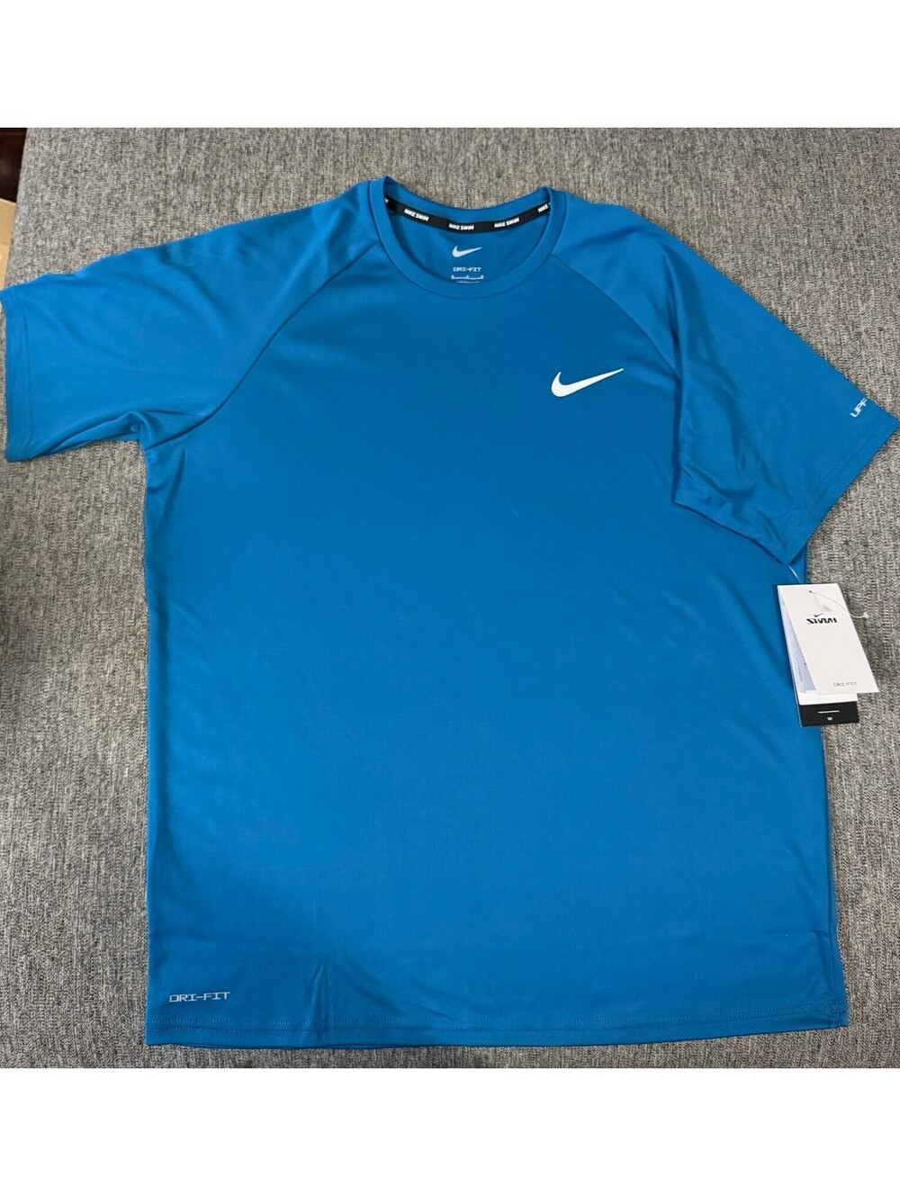 Nike Swim Dri-Fit Men’s Medium Teal Short Sleeve Shirt UPF 40+ NESSA586-448 New